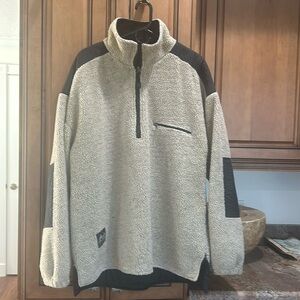 Black Ice Men’s ski jacket quarter zip. Inside tags cut out. size XL